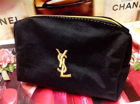 makeup bag yves saint laurent|More.